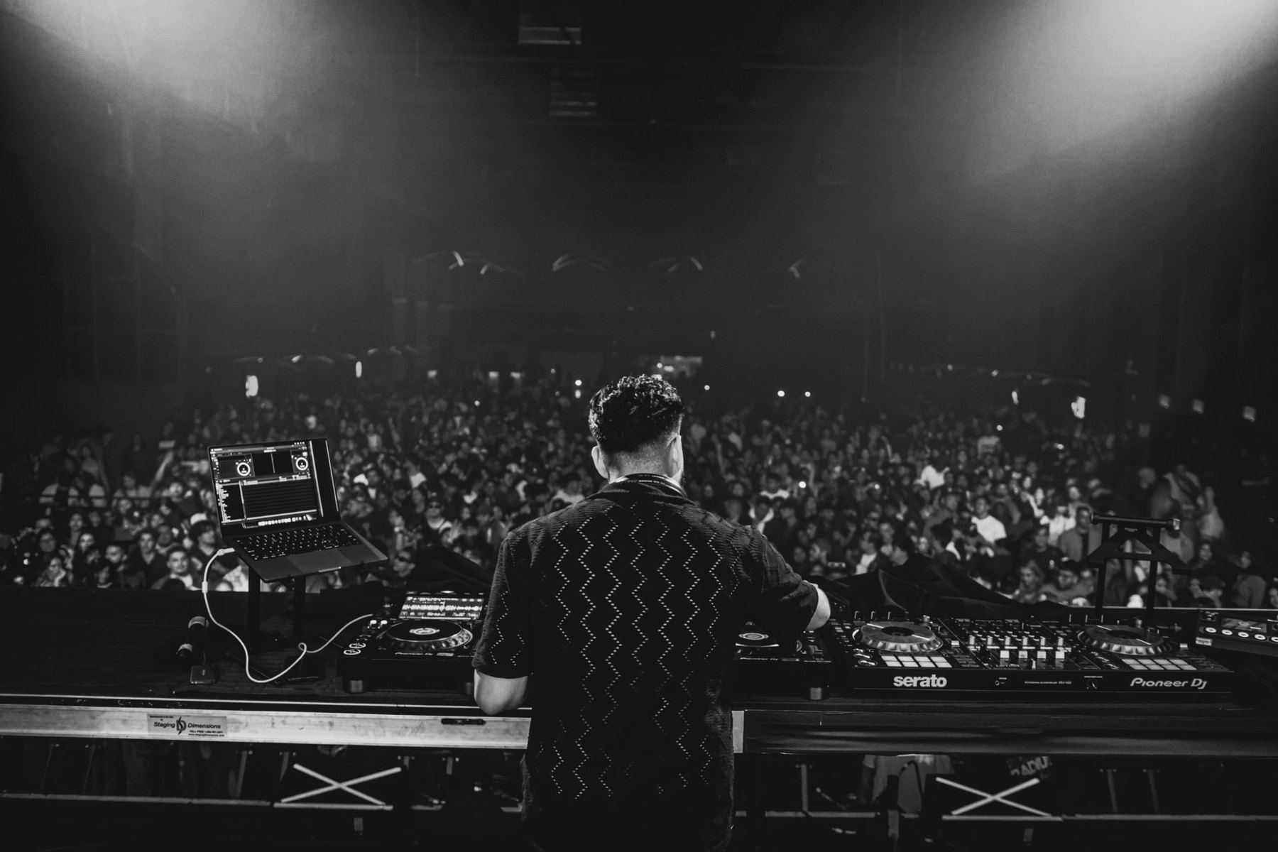 Diego Fernandez DJing for a packed Chicago venue crowd