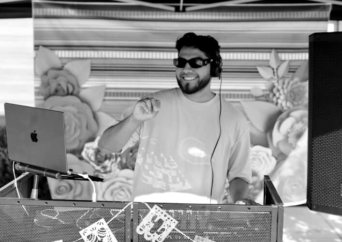 Diego Fernandez DJing an outdoor private celebration